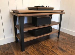 Walnut stereo and turntable console with album storage.