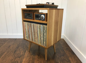 Vertical turntable and stereo console with album storage, quartersawn white oak. 