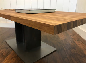 Industrial coffee table, edge-grain walnut with steel I-beam base.