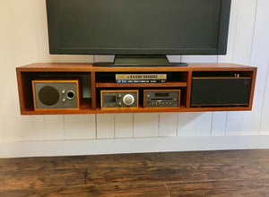 Solid mahogany floating TV and video console. Wall mounted media cabinet.
