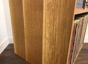 Solid white oak vertical turntable and stereo console with album storage.