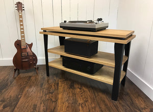 White oak stereo and turntable console with album storage.
