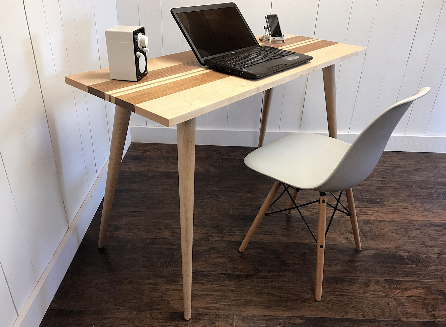 Solid maple mid century style desk with butternut accents.