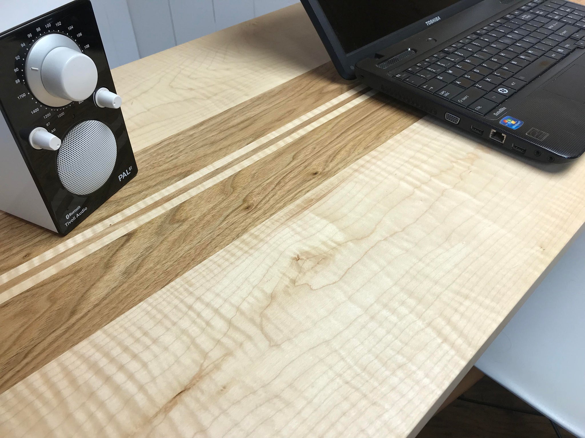 Curly maple desktop with butternut accent. 