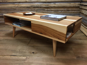 Mid century modern coffee table with storage, shown in solid hickory. 