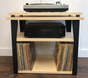 Maple stereo and turntable console with album storage.