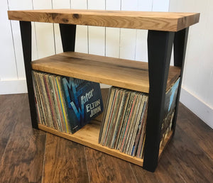 Butternut stereo and turntable console with album storage.