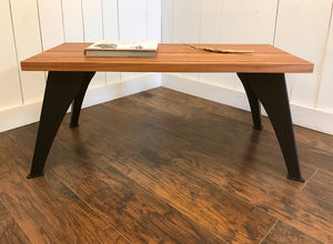 Contemporary coffee table, solid mahogany with steel legs.