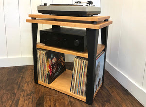 Cherry stereo and turntable console with album storage.