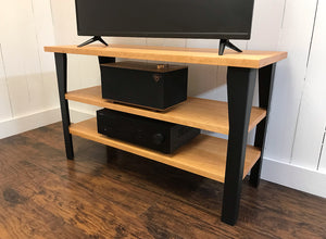 Cherry TV and media console with optional album storage.