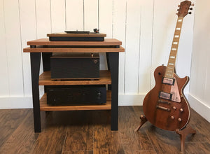 Mahogany stereo and turntable console with optional album storage.