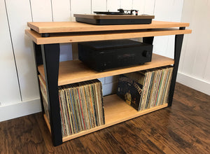 Cherry stereo and turntable console with album storage.