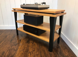 Cherry stereo and turntable console with optional album storage.