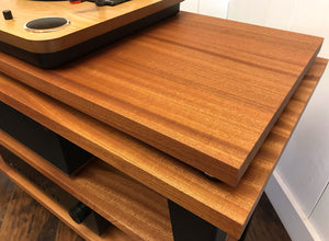 Mahogany stereo and turntable console with album storage.