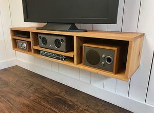 White oak floating TV and video console. Wall mounted media cabinet.