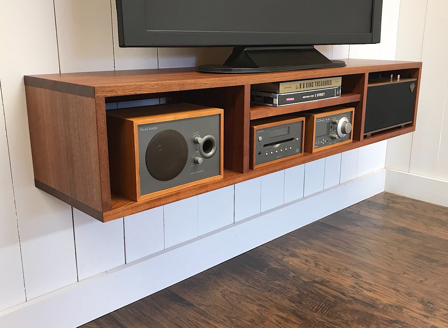 Solid mahogany floating TV and video console. Wall mounted media